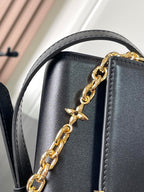 Capucines Wallet On Chain in Black Leather with Gold Chain
