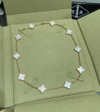 Necklace with flower-shaped pendants on a green box