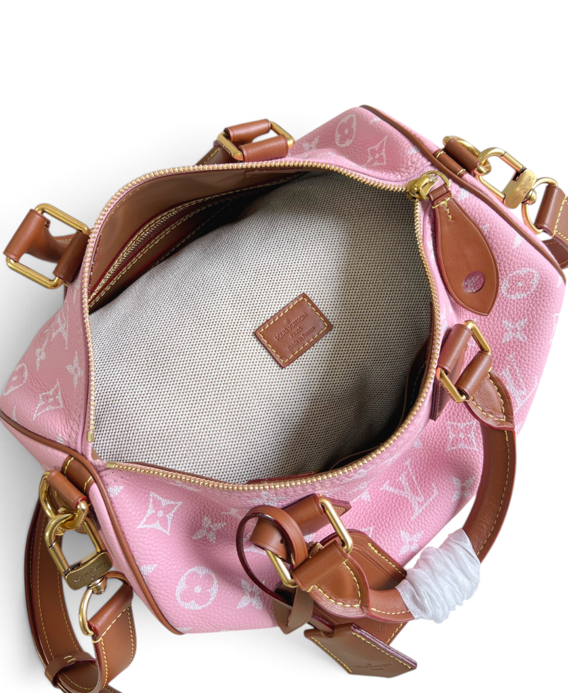 SWORD LUXURY marka pembe deri Louis Vuitton Speedy Bandouliere 30 çanta, iç astar ve altın tonlu donanım detayları.