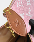 SWORD LUXURY Louis Vuitton Speedy Bandoulière 30 pembe monogram deri çanta detayı ve altın tonlu donanım