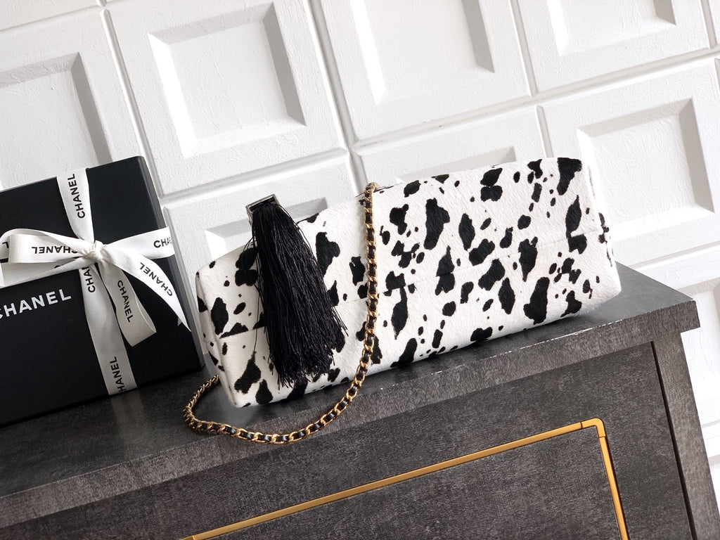 Pony Hair Quilted Triangle Top Handle Bag