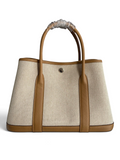 SWORD LUXURY marka, bej kanvas ve taba deri detaylı, 30 cm boyutunda şık Hermès Garden Party tote çanta.