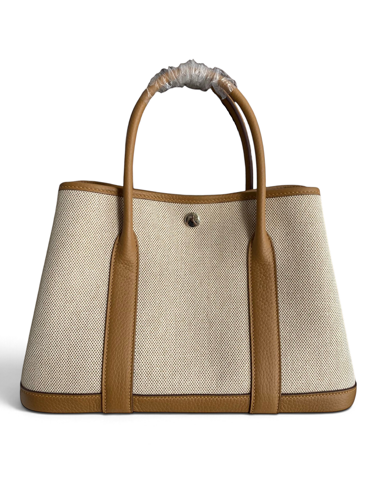 SWORD LUXURY marka, bej kanvas ve taba deri detaylı, 30 cm boyutunda şık Hermès Garden Party tote çanta.