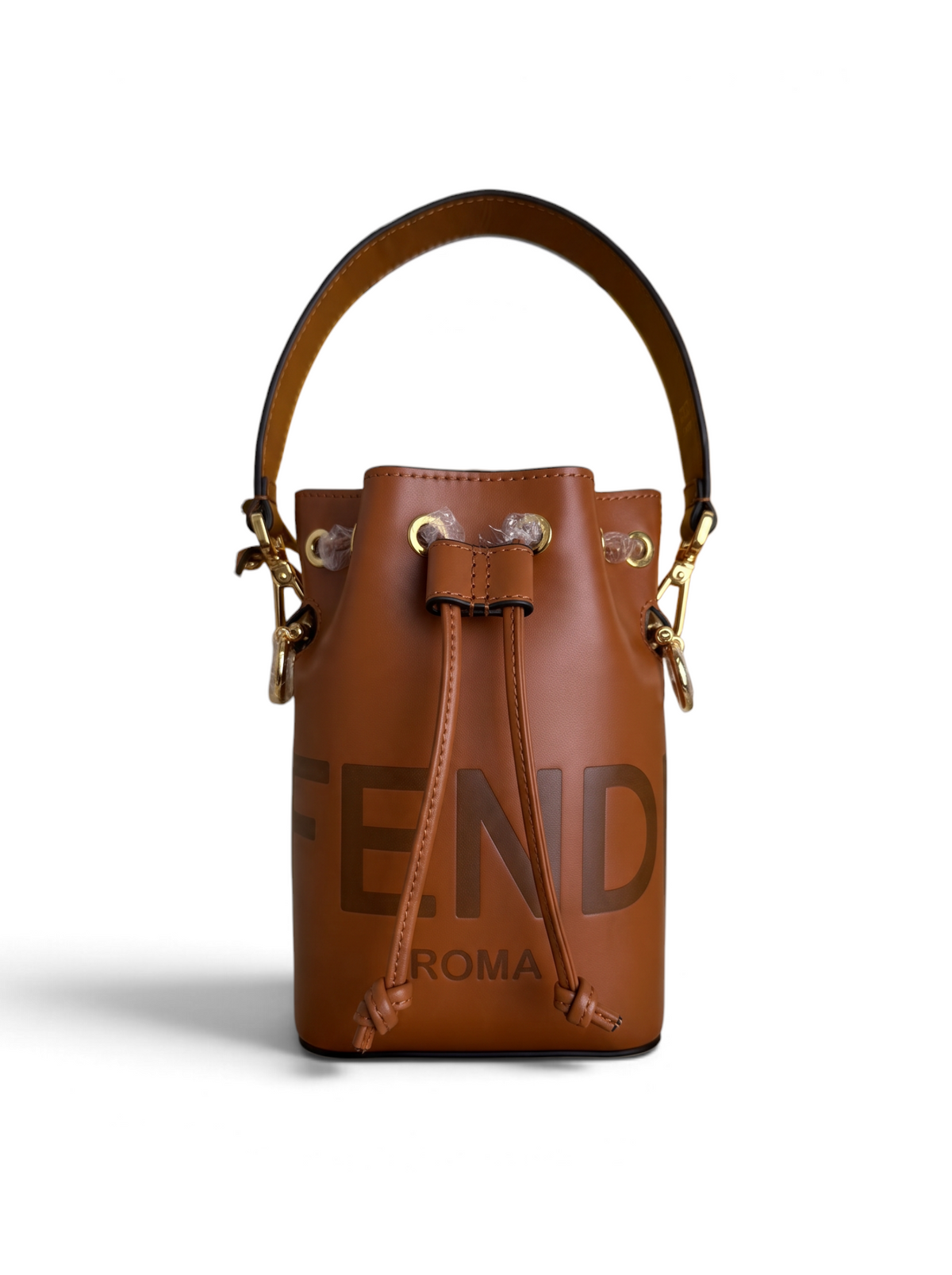 SWORD LUXURY Fendi Mon Tresor taba rengi deri büzgülü kova çanta, altın tonlu metal detaylar ve ayarlanabilir askı.