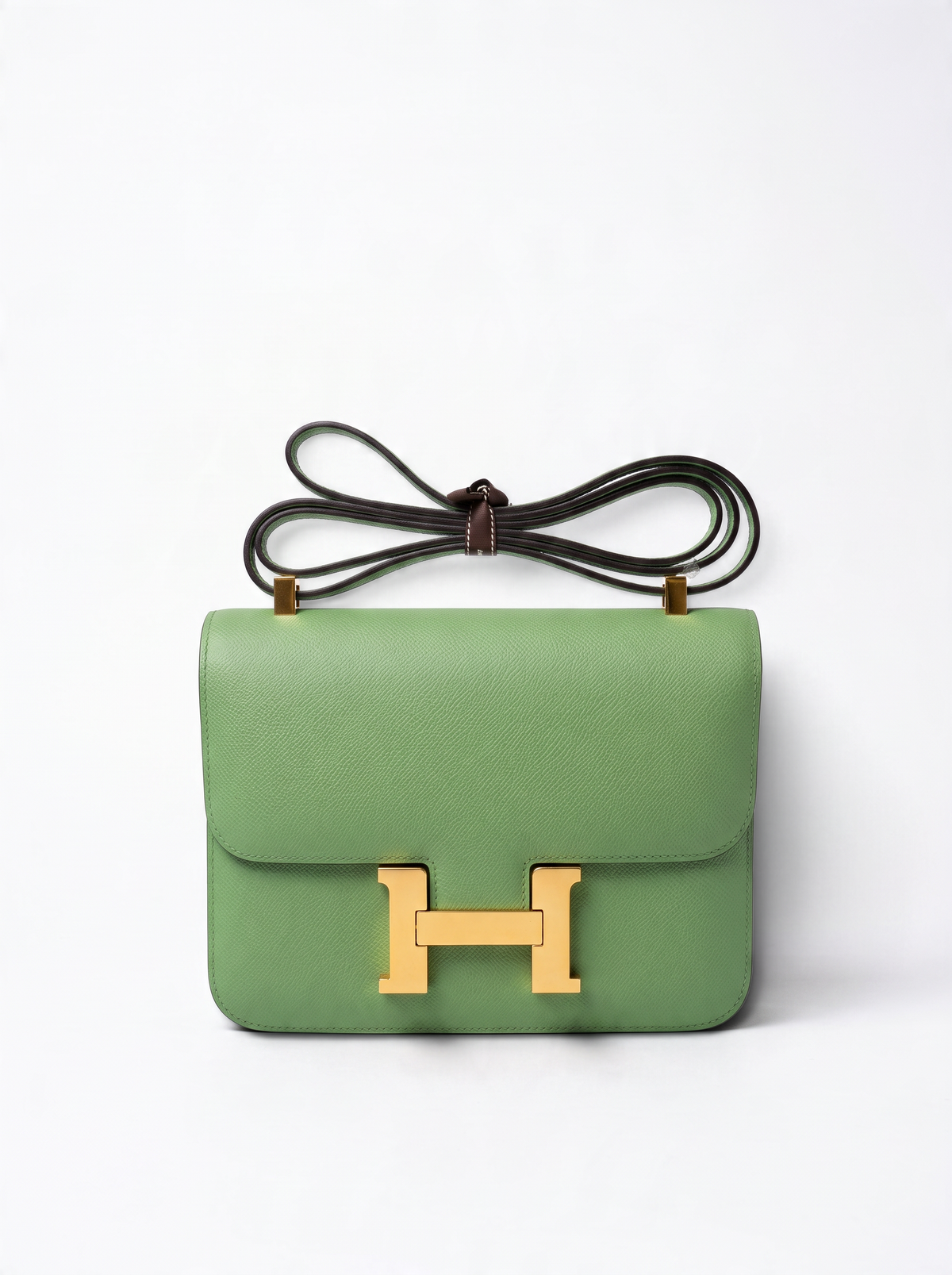 SWORD LUXURY marka, altın tonlu H tokalı, yeşil Epsom deri Hermès Constance 18 omuz çantası.
