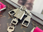 Keepall Bandoulière 50 – Monogram Canvas with Pink Leather Trim
