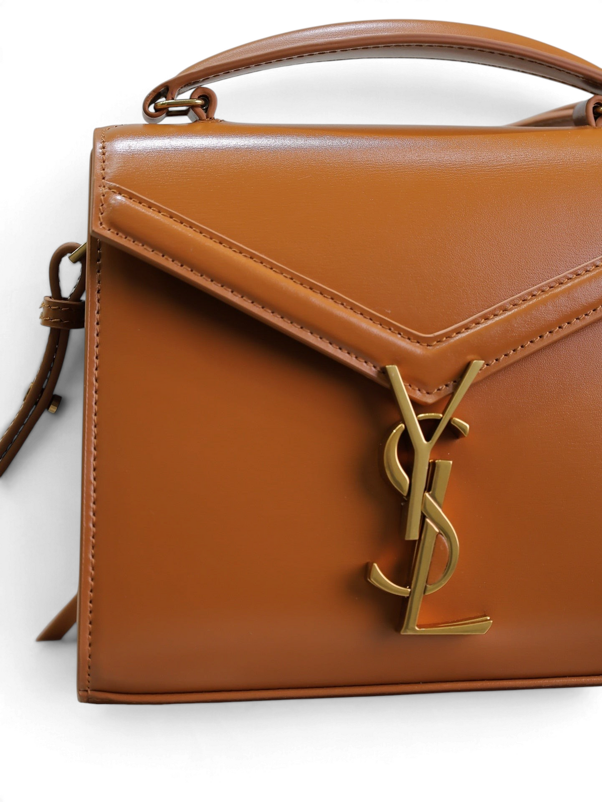 SWORD LUXURY marka, altın YSL logolu, taba rengi pürüzsüz deri Cassandra mini el çantası.