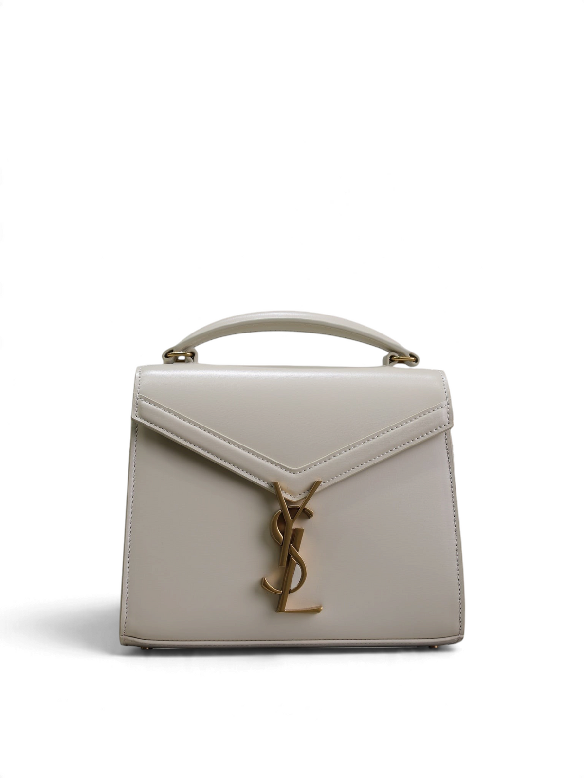 SWORD LUXURY Cassandra mini çanta, krem rengi pürüzsüz deri, altın tonlu YSL monogram logolu ve üst saplı tasarım.