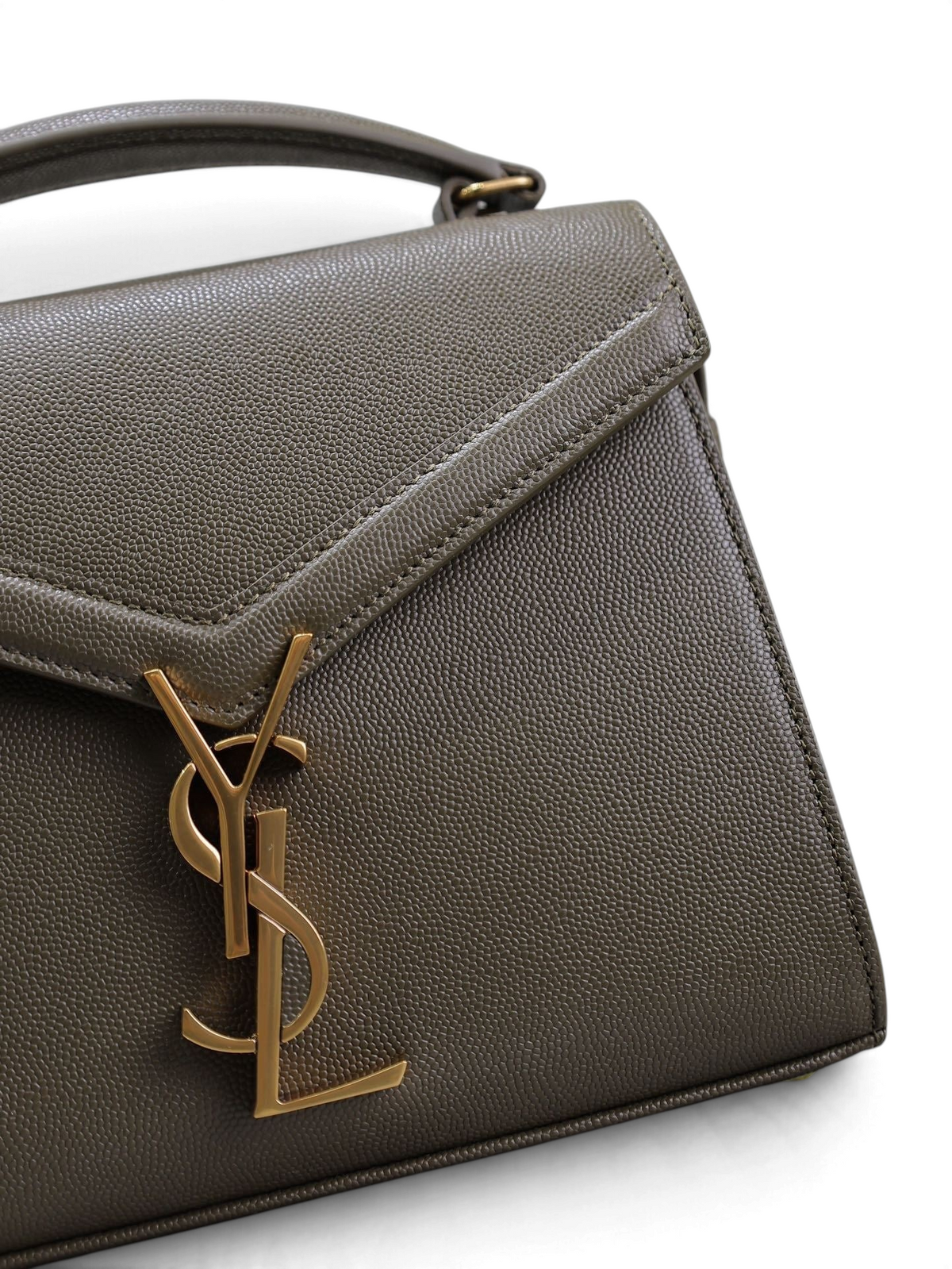 SWORD LUXURY Cassandra mini çanta, zeytin yeşili taneli dana derisi, altın rengi YSL monogram detaylı ve zarif saplı.