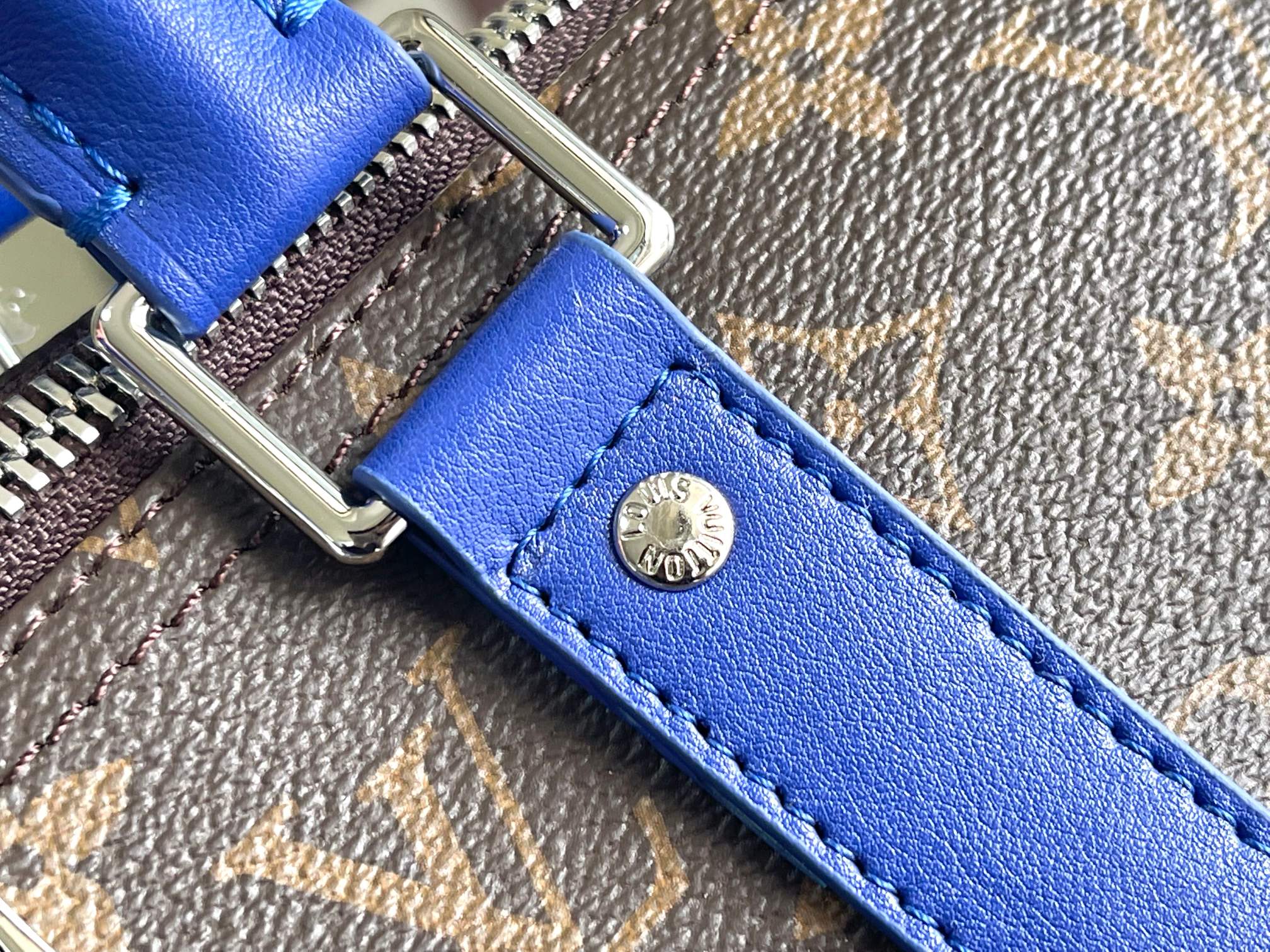 Keepall Bandoulière 50 – Monogram Canvas with Blue Leather Trim