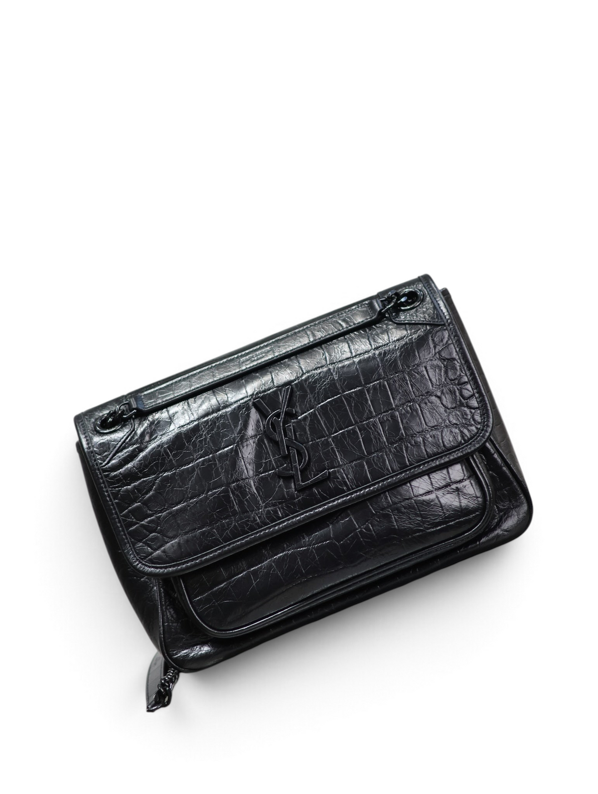 SWORD LUXURY siyah timsah derisi görünümlü Saint Laurent Niki omuz çantası, tonal YSL logolu ve zincir askılı.
