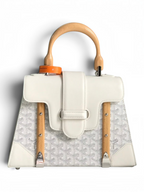 SWORD LUXURY white Goyardine canvas Saïgon PM handbag with beechwood handle and leather trim, shown with brand packaging.