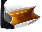 SWORD LUXURY Saïgon PM handbag interior featuring white Goyardine canvas, smooth leather trim, and vibrant yellow lining.