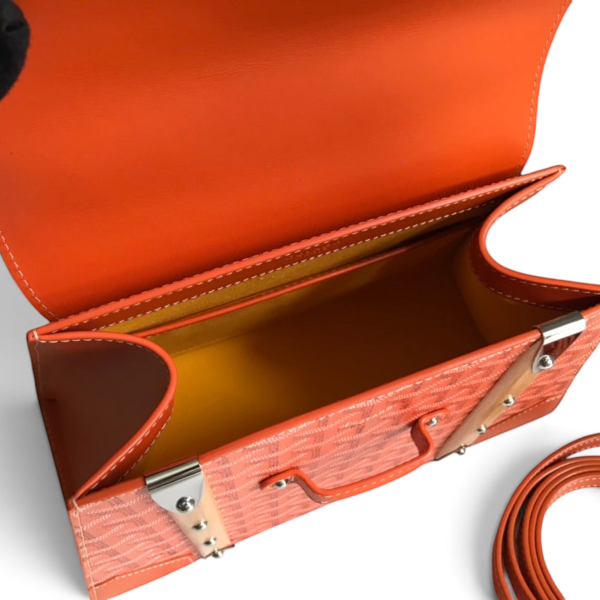 SWORD LUXURY Saïgon PM handbag in orange Goyardine canvas with smooth leather trim and a beechwood top handle.