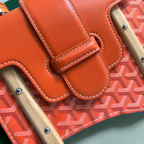 SWORD LUXURY Saïgon PM handbag featuring orange smooth leather flap with white contrast stitching and tab closure.