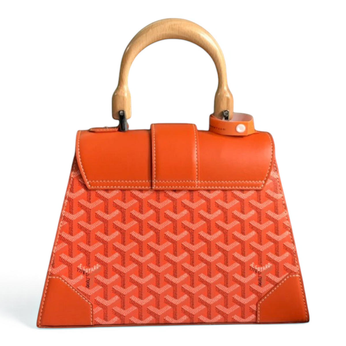 SWORD LUXURY orange Goyardine canvas Saïgon PM handbag with a beechwood top handle and detachable leather strap.