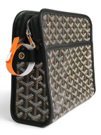 SWORD LUXURY Jouvence toiletry bag in signature Goyardine canvas with black leather trim and zip-top closure.