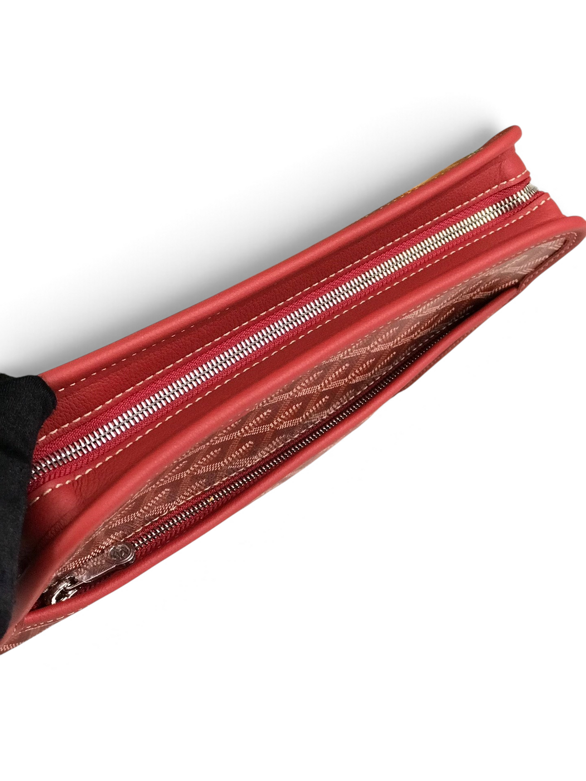 SWORD LUXURY Jouvence toiletry bag in red Goyardine canvas with leather trim and silver zip closure.