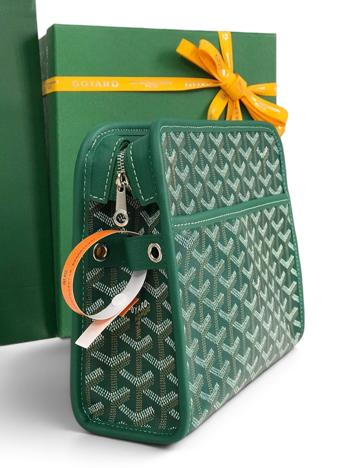 SWORD LUXURY Jouvence green Goyardine canvas toiletry bag with leather trim and zip closure, shown with brand packaging.