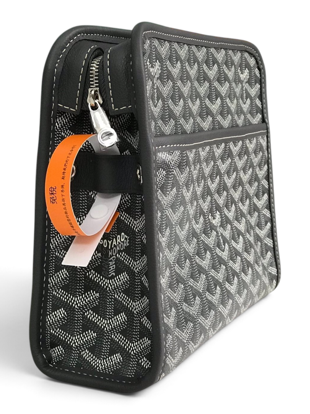 SWORD LUXURY Jouvence toiletry bag in grey Goyardine canvas with leather trim and zip closure, side view.