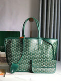 Green patterned handbag on a white surface with a blurred background