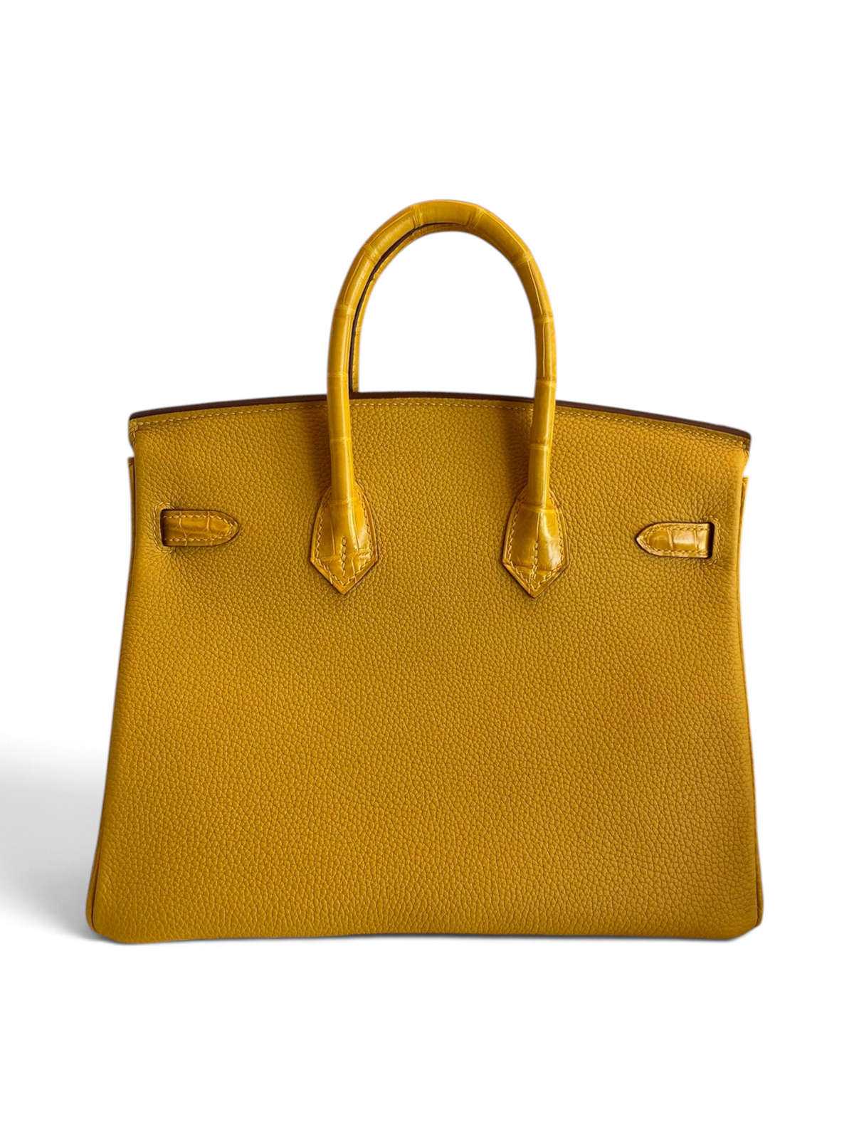 SWORD LUXURY Jaune Ambre sarı renkli, timsah derisi detaylı ve Togo deri gövdeli Hermès Birkin 25 el çantası.