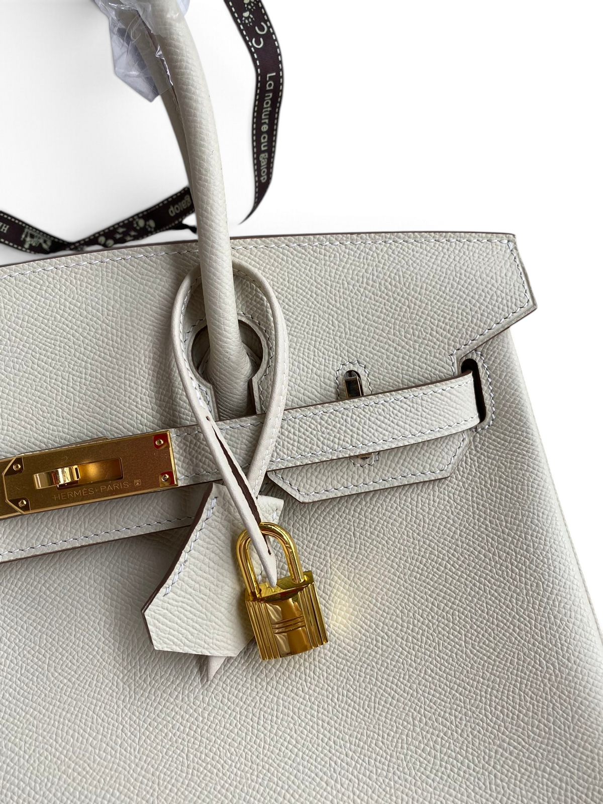 SWORD LUXURY beyaz Epsom deri Hermès Birkin 30 çanta, altın rengi metal kilit ve detaylara sahip.