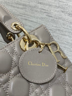 Lady Quilted Leather Top Handle Bag