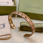 Antique Gold Open Cuff Bracelet with Engraved Double G Motif