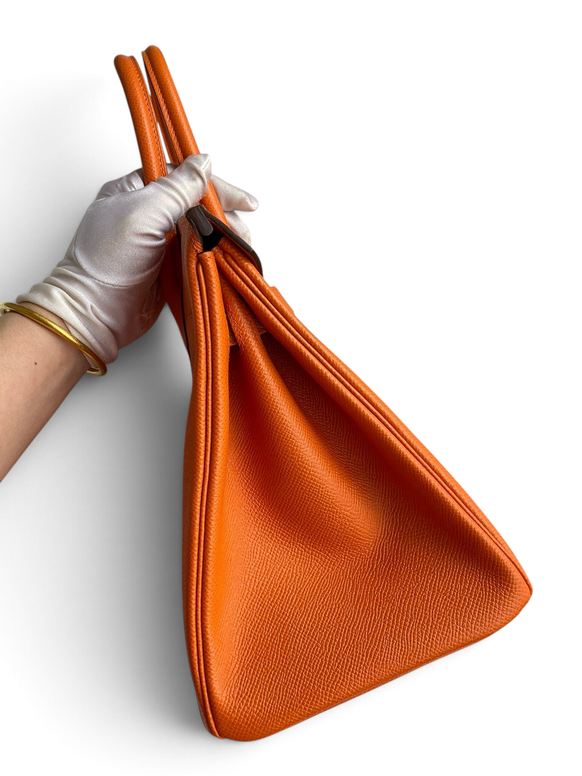 SWORD LUXURY marka turuncu Epsom deri Hermès Birkin 30 çanta, kutusunda yan profilden görünüm.