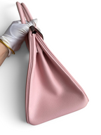 SWORD LUXURY marka pembe Epsom deri Hermès Birkin 30 çanta, yan profil görünümü ve kaliteli işçilik detayları.