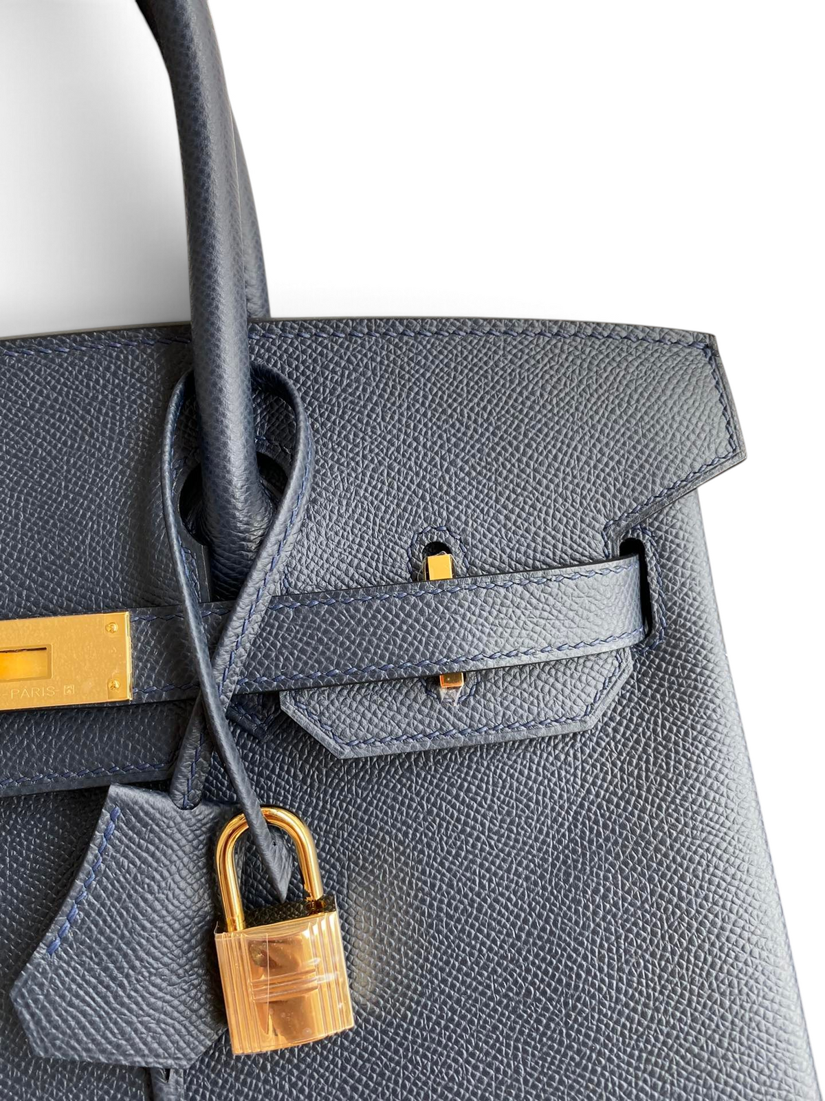 SWORD LUXURY lacivert Epsom deri Hermès Birkin 30 çanta, altın donanımlı kilit ve clochette detaylı.