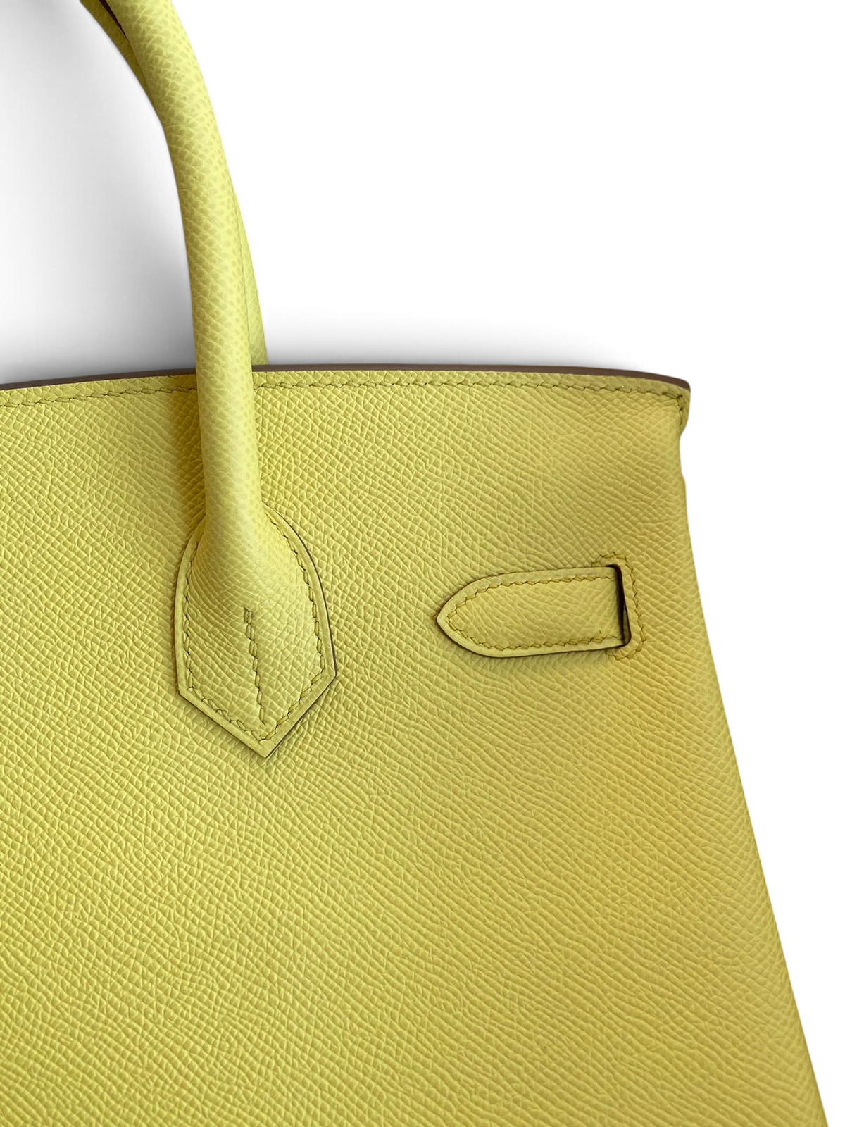 SWORD LUXURY sarı Epsom deri Hermès Birkin 30 çanta detayı, dokulu deri yüzeyi ve zarif dikişleri ile.