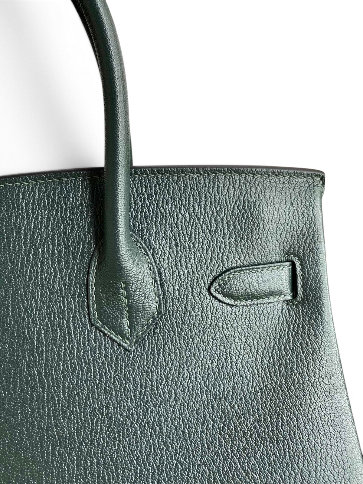 SWORD LUXURY marka koyu yeşil Togo deri Hermès Birkin 30 çanta, belirgin dokulu yüzeyi ve zarif dikiş detayları.
