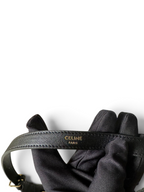 SWORD LUXURY Heloïse Triomphe siyah deri omuz çantası askısında altın rengi Celine Paris logosu detayı