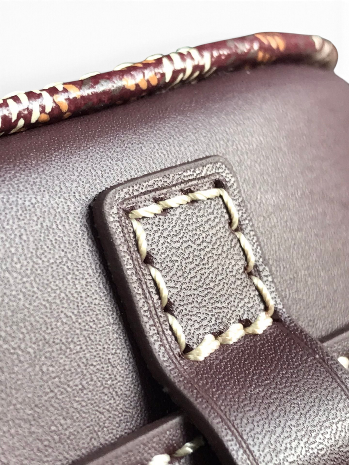 SWORD LUXURY Belvédère II messenger bag featuring dark brown leather trim with detailed contrast stitching