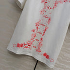 Embroidered Cotton T-Shirt – Signature Floral Detail