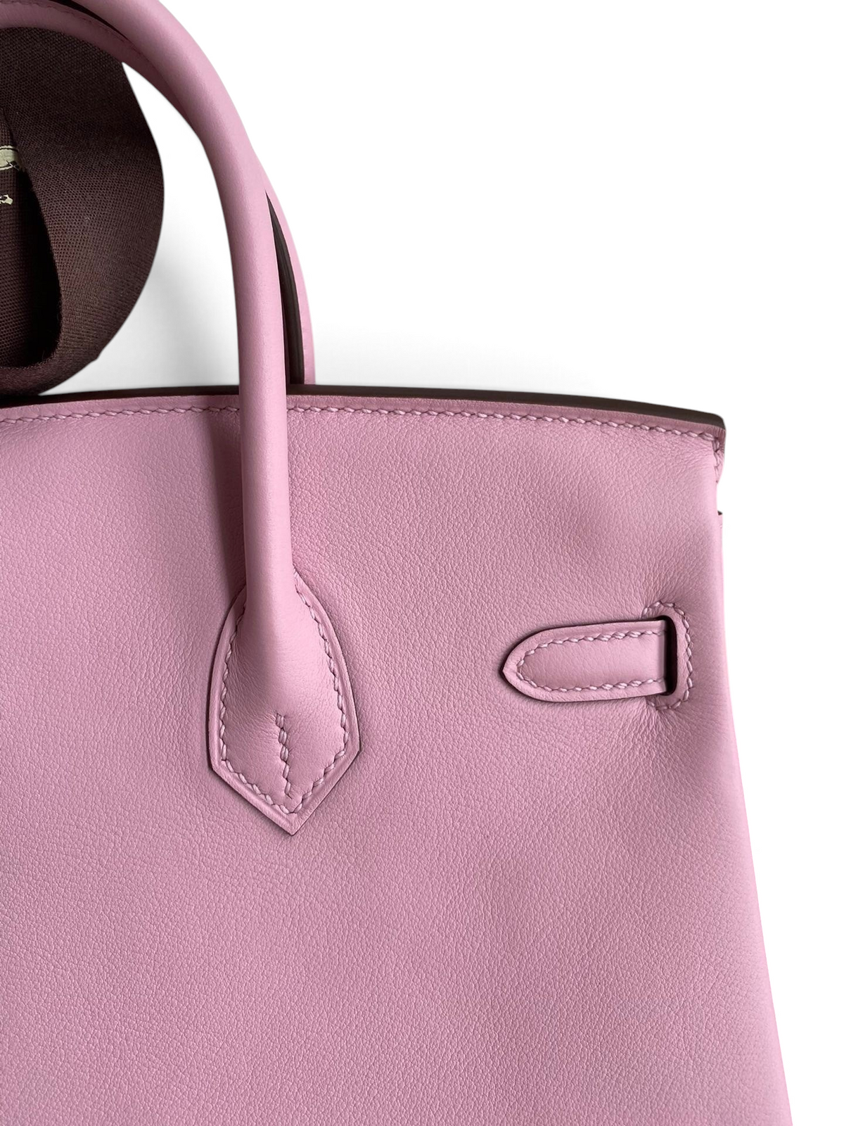 SWORD LUXURY marka pembe Swift dana derisi Hermès Birkin 25cm çanta, detaylı dikişleri ve zarif dokusuyla.