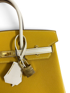SWORD LUXURY sarı ve beyaz iki tonlu Epsom deri Hermès Birkin 25cm çanta, altın rengi kilit ve detaylar ile.