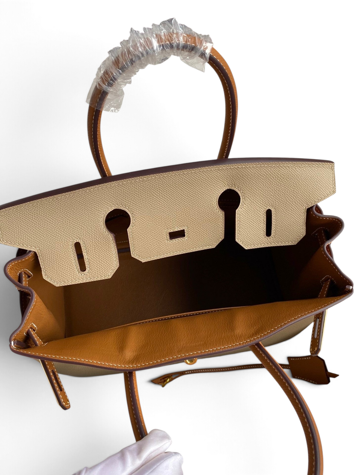 SWORD LUXURY marka, iki tonlu bej ve taba rengi, Epsom deri, 25 cm Hermès Birkin çanta, kutu içerisinde üstten görünüm.