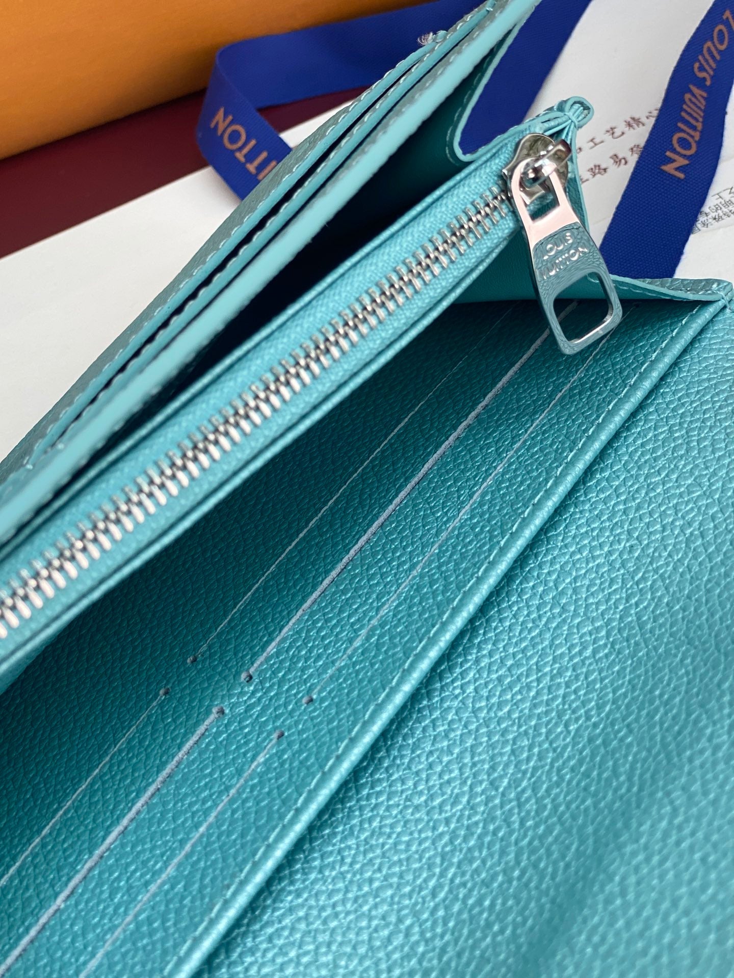 Sarah Wallet – Monogram Empreinte Leather (Blue)