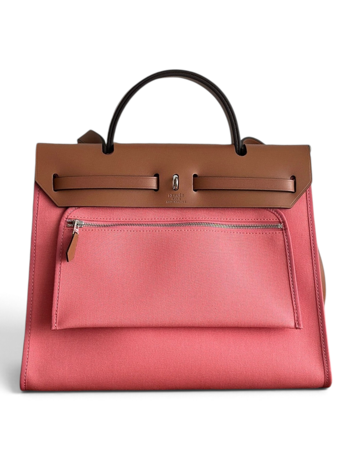 SWORD LUXURY marka pembe kanvas ve kahverengi deri detaylı Hermès Herbag 31 çanta, şık ve modern bir tasarım.