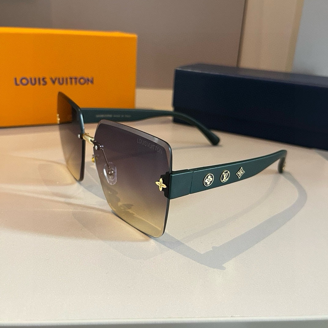Louis Vuitton sunglasses with gradient lenses on a branded surface, featuring the Louis Vuitton logo.