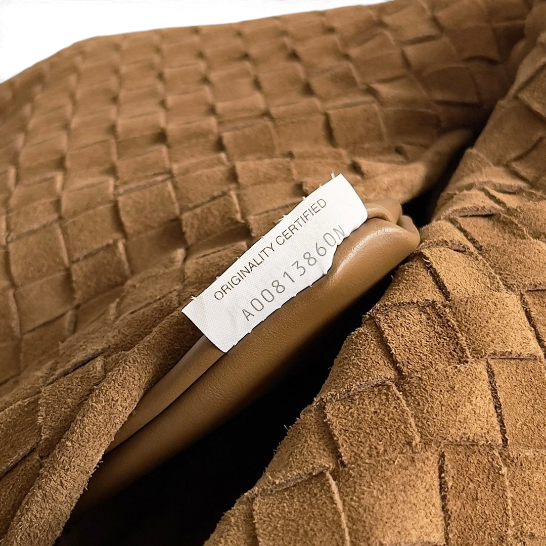 SWORD LUXURY taba rengi, el örgüsü deri detaylı hobo çanta iç kısmında orijinallik sertifikası etiketi