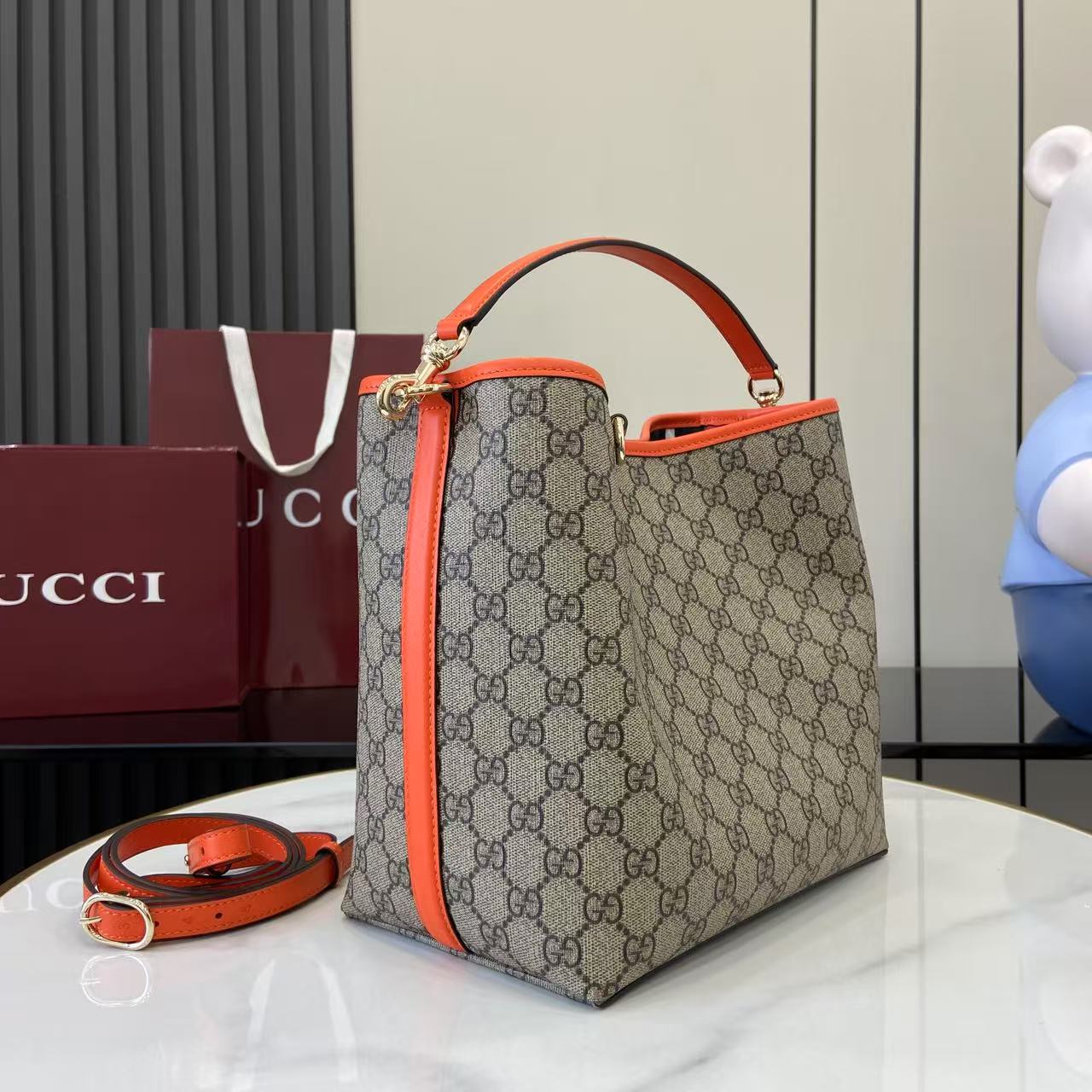 GG Emblem Canvas Shoulder Bag with Orange Leather Trim
