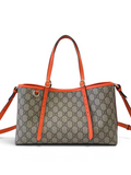 SWORD LUXURY GG Supreme kanvas tote çanta, canlı turuncu deri detayları ve ikonik monogram deseniyle şık bir tasarım.