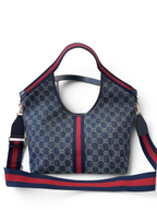 SWORD LUXURY Gucci Giglio GG Supreme kanvas tote çanta, ikonik kırmızı-yeşil şerit detaylı ve ayarlanabilir askılı.