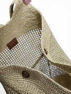 SWORD LUXURY Icare Raffia büyük boy tote çanta, bej el örgüsü dokusu ve iç detayları ile yazlık şık tasarım.