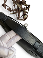 SWORD LUXURY siyah Epsom deri Mini Kelly 22cm çanta, üstten tutmalı ve detaylı dikişli tasarım.