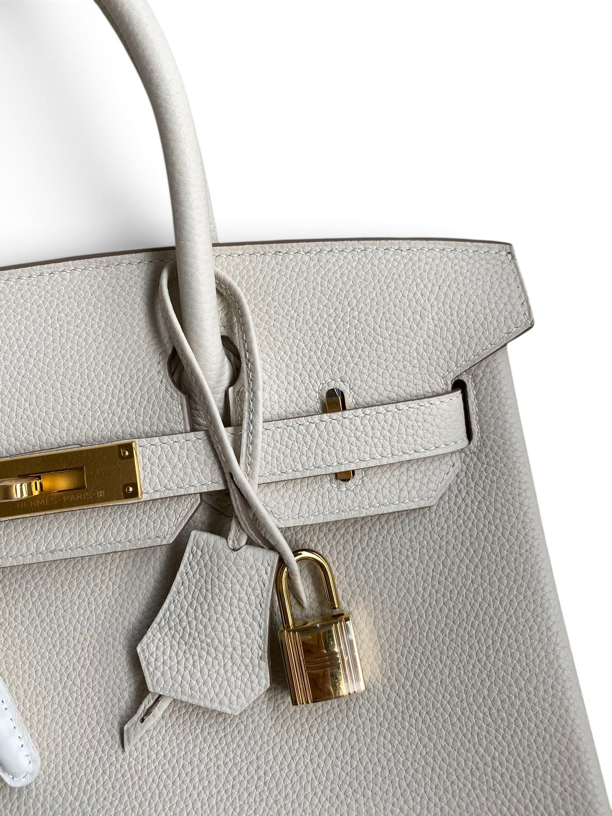 SWORD LUXURY marka beyaz Togo deri Hermès Birkin 30 çanta, altın rengi kilit ve donanım detaylarıyla.